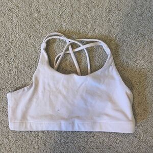 Athleta girl blush pink bra gently used with slight stain on front